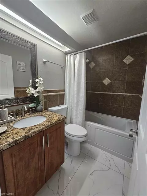 Bath - 2960 22nd Ave NE, Naples, FL 34120 photo 2 of 2