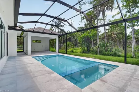 Exterior - 563 15th St NW, Naples, FL 34120 photo 5 of 6