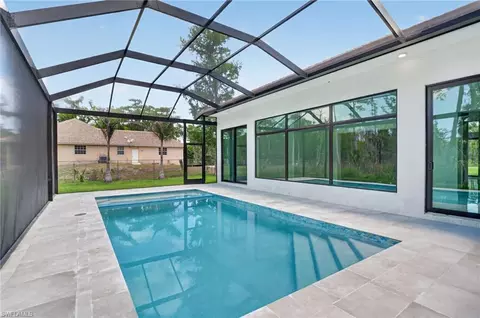 Exterior - 563 15th St NW, Naples, FL 34120 photo 4 of 6