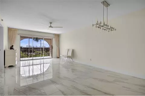 Living - 37 High Point Cir E #602, Naples, FL 34103 photo 1 of 2