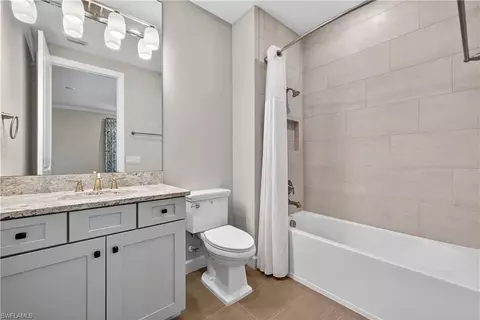 Bath - 8709 Cavano St, Naples, FL 34119 photo 2 of 6