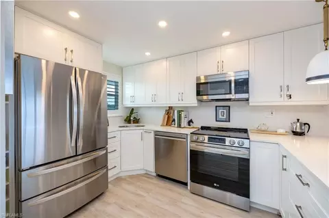 Kitchen - 29 High Point Cir E #403, Naples, FL 34103 photo 3 of 6