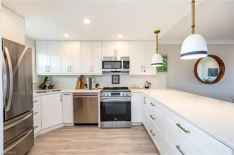 Kitchen - 29 High Point Cir E #403, Naples, FL 34103 photo 4 of 6