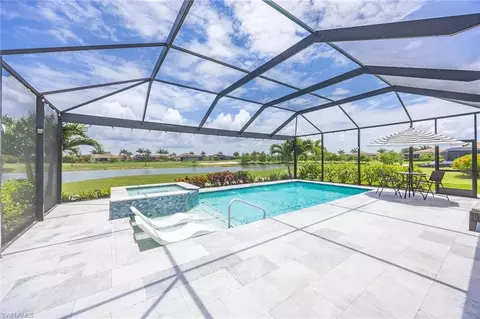 Exterior - 18699 Ensenada Dr, Naples, FL 34114 photo 6 of 12