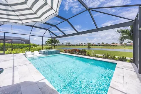 Exterior - 18699 Ensenada Dr, Naples, FL 34114 photo 9 of 12