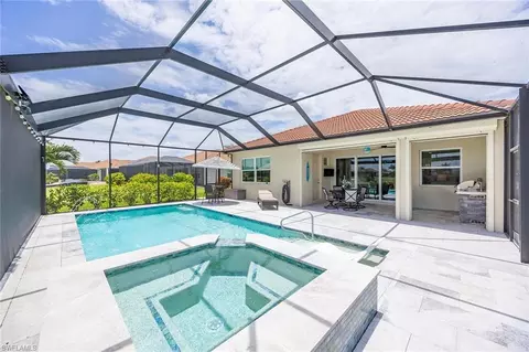 Exterior - 18699 Ensenada Dr, Naples, FL 34114 photo 7 of 12
