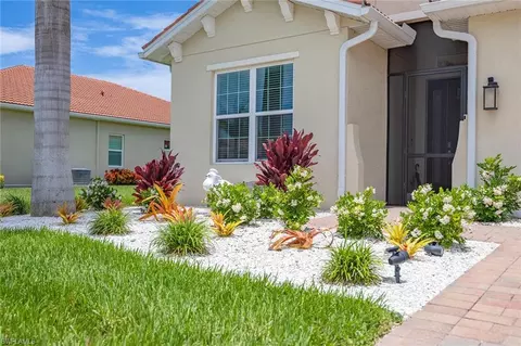 Exterior - 18699 Ensenada Dr, Naples, FL 34114 photo 4 of 12