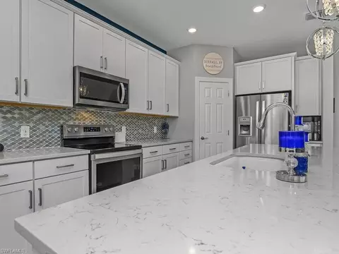 Kitchen - 17581 Ashcomb Way, Estero, FL 33928 photo 5 of 8