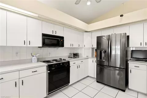 Kitchen - 526 100th Ave N, Naples, FL 34108 photo 2 of 3