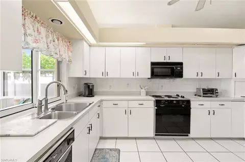 Kitchen - 526 100th Ave N, Naples, FL 34108 photo 1 of 3