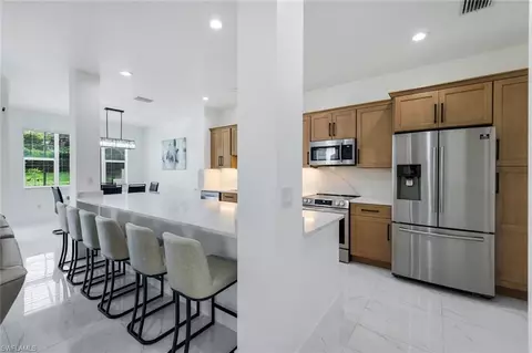 Kitchen - 20370 Larino Loop, Estero, FL 33928 photo 2 of 6