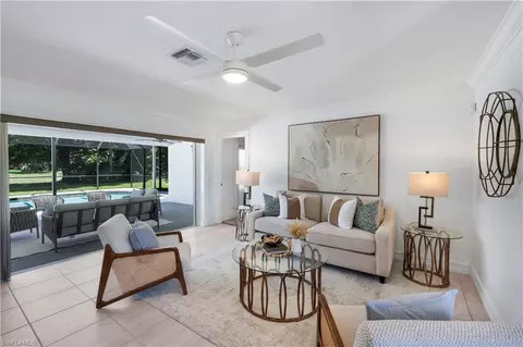 Living - 675 Pompano Dr, Naples, FL 34110 photo 1 of 5