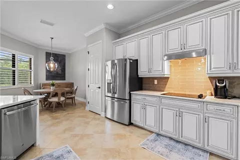 Kitchen - 9352 Vercelli Ct, Naples, FL 34113 photo 6 of 6