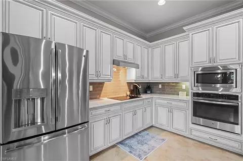 Kitchen - 9352 Vercelli Ct, Naples, FL 34113 photo 5 of 6