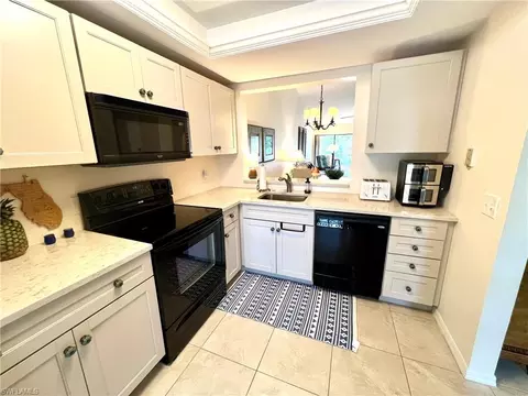 Kitchen - 705 Augusta Blvd #9, Naples, FL 34113 photo 1 of 4