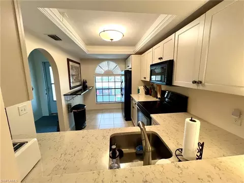 Kitchen - 705 Augusta Blvd #9, Naples, FL 34113 photo 3 of 4