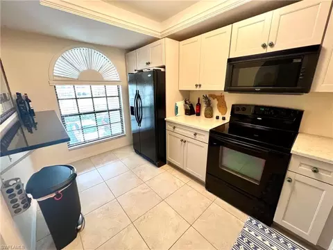 Kitchen - 705 Augusta Blvd #9, Naples, FL 34113 photo 2 of 4