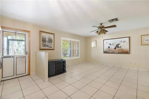Living - 704 106th Ave N, Naples, FL 34108 photo 3 of 3