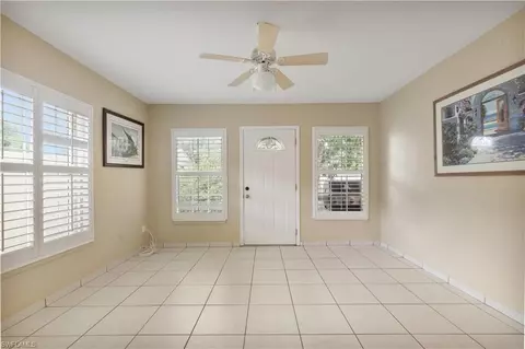 Living - 704 106th Ave N, Naples, FL 34108 photo 1 of 3