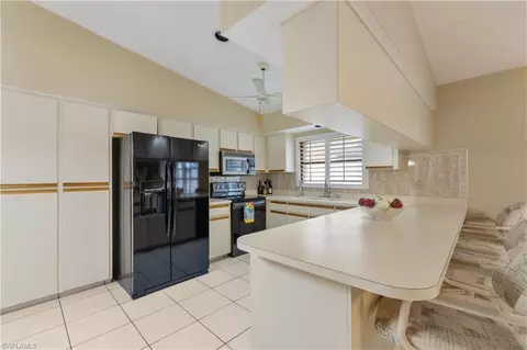 Kitchen - 704 106th Ave N, Naples, FL 34108 photo 2 of 2