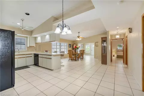 Entry Way - 704 106th Ave N, Naples, FL 34108 photo 1 of 2