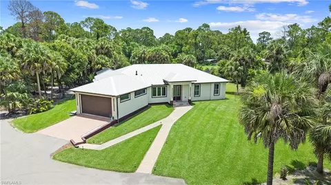 Exterior - 556 6th St SE, Naples, FL 34117 photo 4 of 11