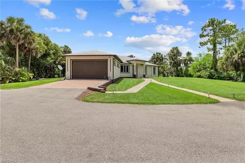Exterior - 556 6th St SE, Naples, FL 34117 photo 10 of 11