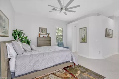 Bedroom - 516 Eagle Creek Dr, Naples, FL 34113 photo 4 of 7