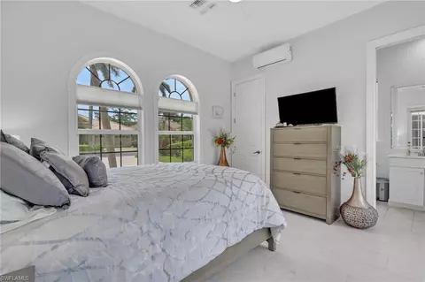 Bedroom - 516 Eagle Creek Dr, Naples, FL 34113 photo 3 of 7