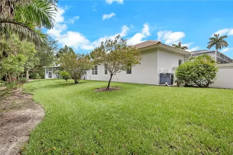 Exterior - 516 Eagle Creek Dr, Naples, FL 34113 photo 5 of 8
