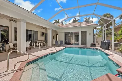 Exterior - 516 Eagle Creek Dr, Naples, FL 34113 photo 7 of 8
