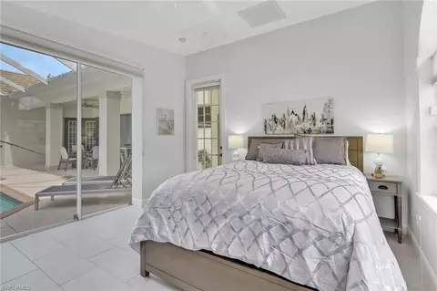 Bedroom - 516 Eagle Creek Dr, Naples, FL 34113 photo 1 of 7