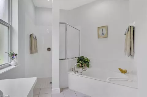 Bath - 516 Eagle Creek Dr, Naples, FL 34113 photo 1 of 5