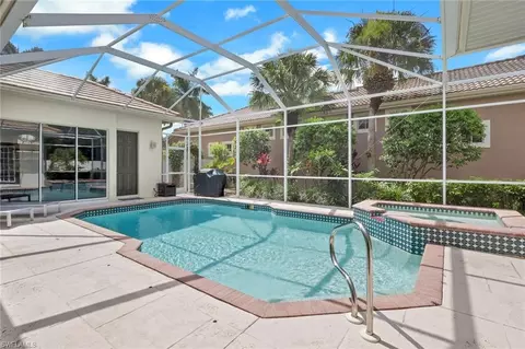 Exterior - 516 Eagle Creek Dr, Naples, FL 34113 photo 6 of 8