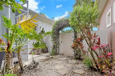 Exterior - 516 Eagle Creek Dr, Naples, FL 34113 photo 4 of 8