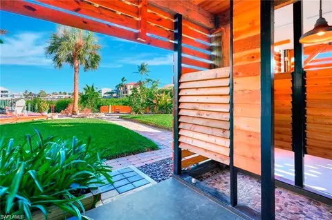 Exterior - 86 Dolphin Cir, Naples, FL 34113 photo 5 of 8