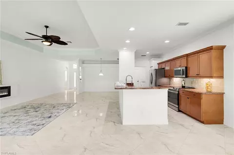 Living - 13599 Troia Dr, Estero, FL 33928 photo 6 of 8