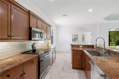 Kitchen - 13599 Troia Dr, Estero, FL 33928 photo 3 of 4