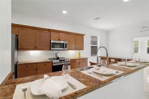 Kitchen - 13599 Troia Dr, Estero, FL 33928 photo 1 of 4