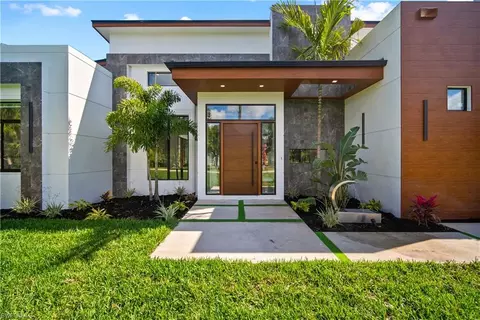 Exterior - 390 3rd St NW, Naples, FL 34120 photo 5 of 11