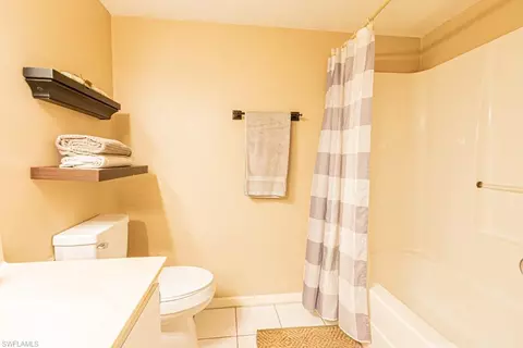 Bath - 130 Cypress Way E #1, Naples, FL 34110 photo 4 of 6