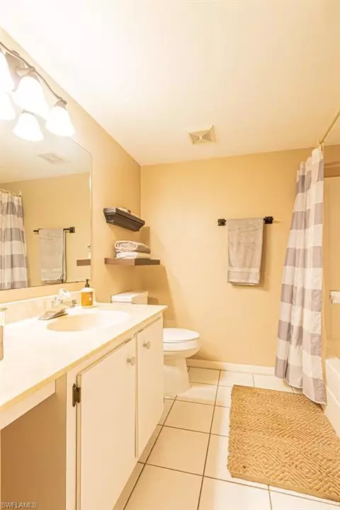 Bath - 130 Cypress Way E #1, Naples, FL 34110 photo 5 of 6