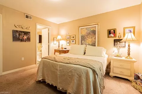 Bedroom - 130 Cypress Way E #1, Naples, FL 34110 photo 5 of 11