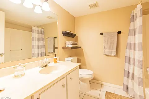 Bath - 130 Cypress Way E #1, Naples, FL 34110 photo 3 of 6