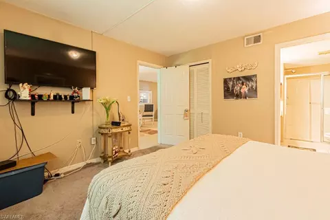 Bedroom - 130 Cypress Way E #1, Naples, FL 34110 photo 6 of 11