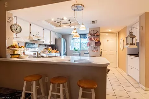 Kitchen - 130 Cypress Way E #1, Naples, FL 34110 photo 2 of 11