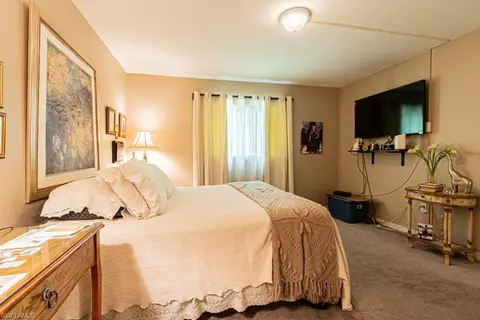 Bedroom - 130 Cypress Way E #1, Naples, FL 34110 photo 3 of 11