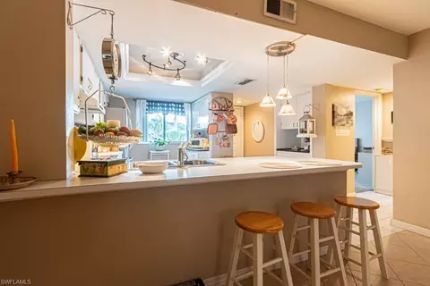 Kitchen - 130 Cypress Way E #1, Naples, FL 34110 photo 3 of 11