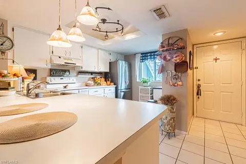 Kitchen - 130 Cypress Way E #1, Naples, FL 34110 photo 1 of 11