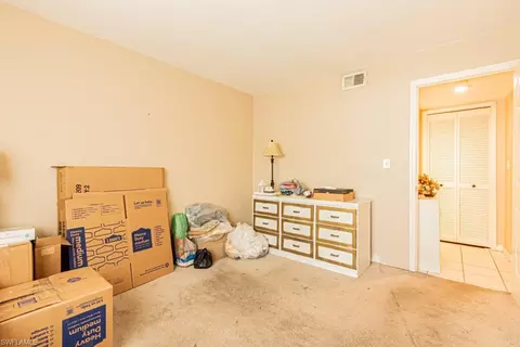Bedroom - 130 Cypress Way E #1, Naples, FL 34110 photo 11 of 11